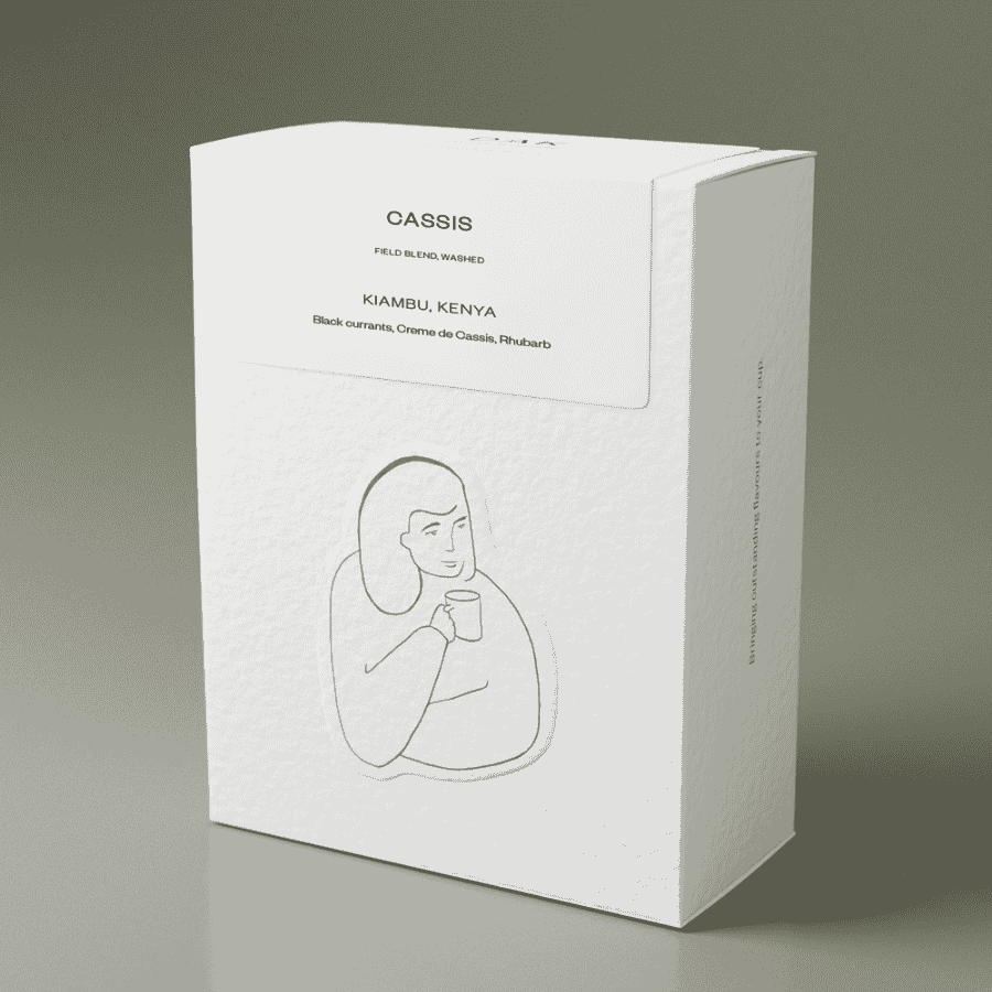 White coffee packaging with 'Cassis' branding and a minimalist illustration of a person holding a coffee cup.
